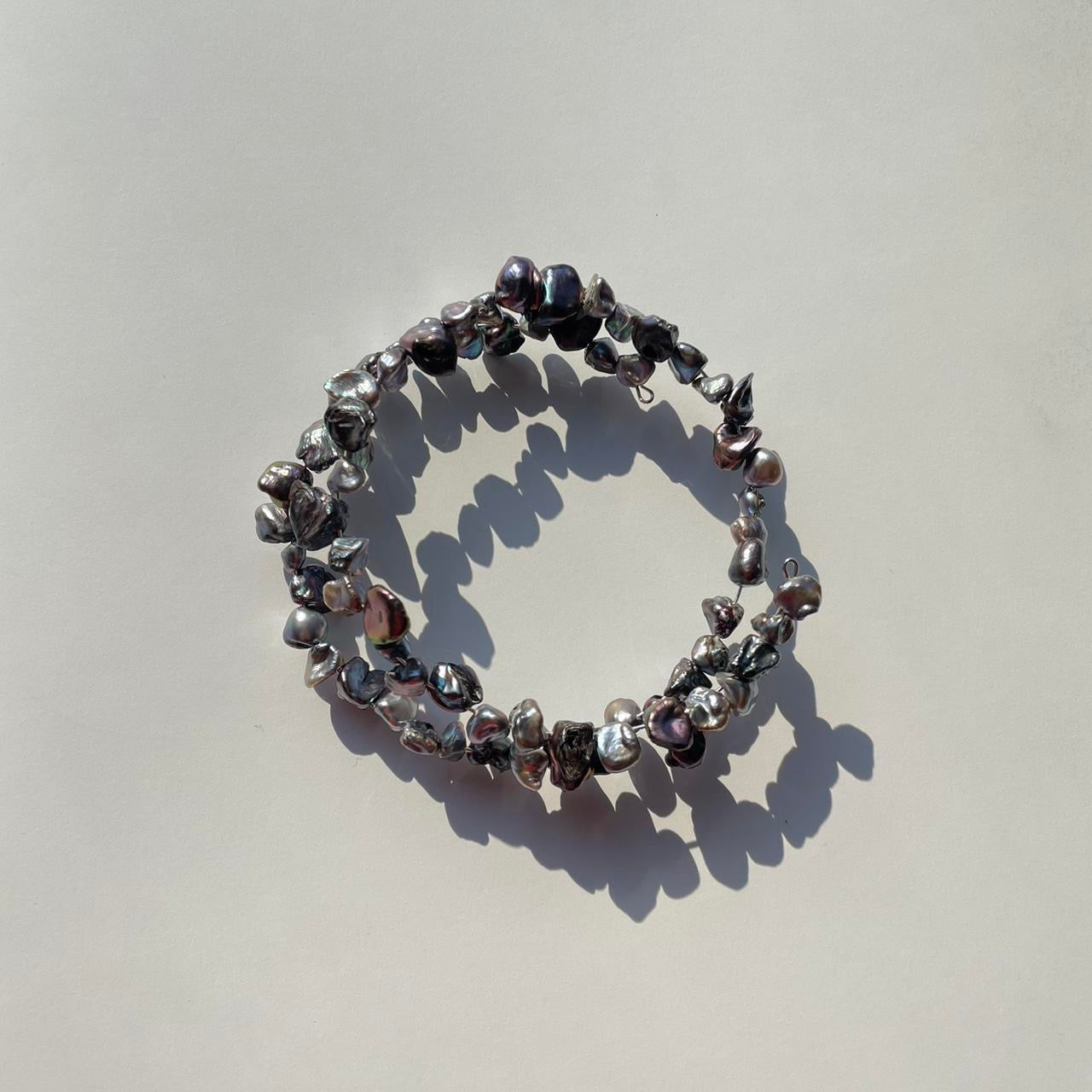 the roped in arm band 。・゚゚・