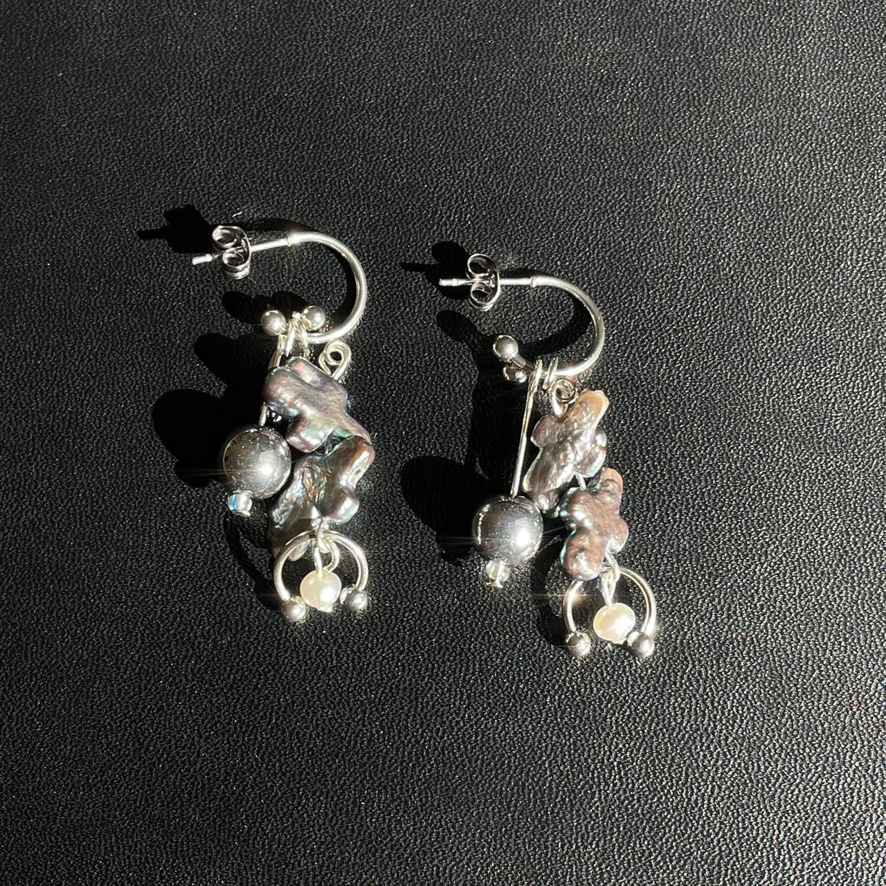 the oil spill earrings *+:。.。O