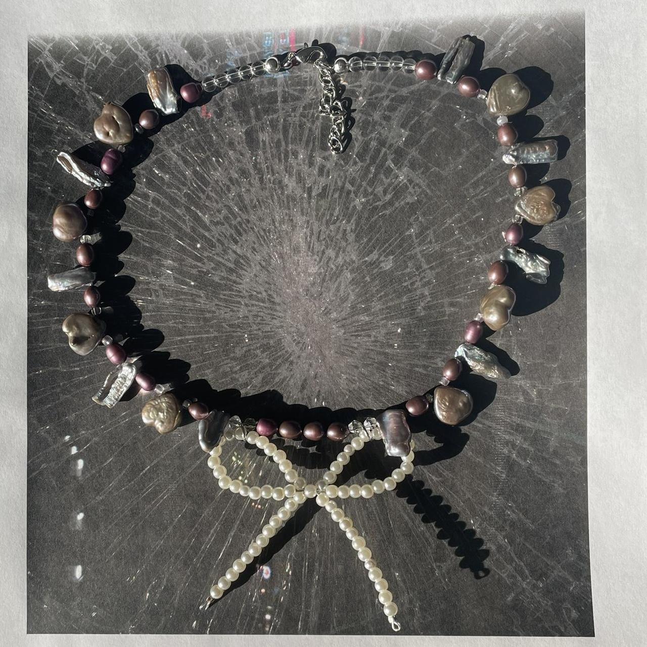 the bowtie necklace ˚*•̩̩͙*˚*· ⋆ ˚。⋆୨୧˚ ̩̩̥͙