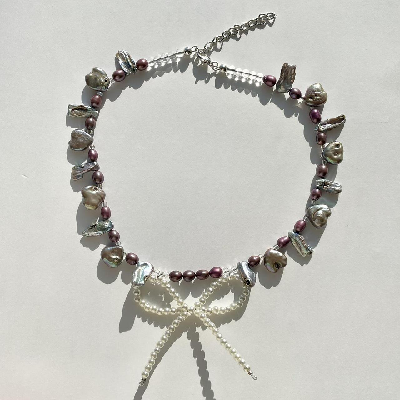 the bowtie necklace ˚*•̩̩͙*˚＊· ⋆ ˚｡⋆୨୧˚ ̩̩̥͙